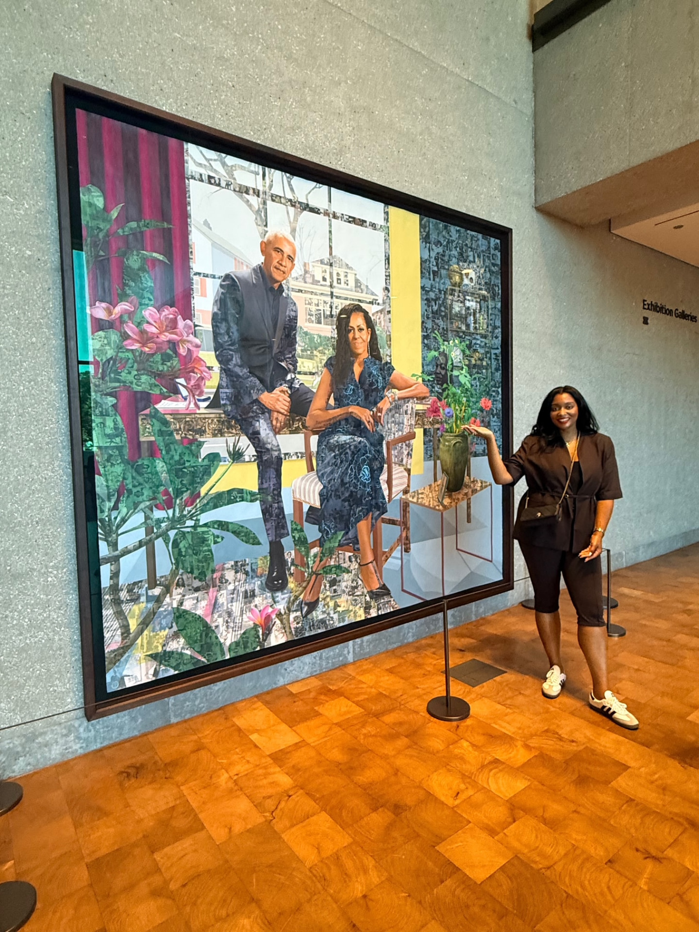Yvonne Harper beside the Obama portrait at the National Portrait Gallery