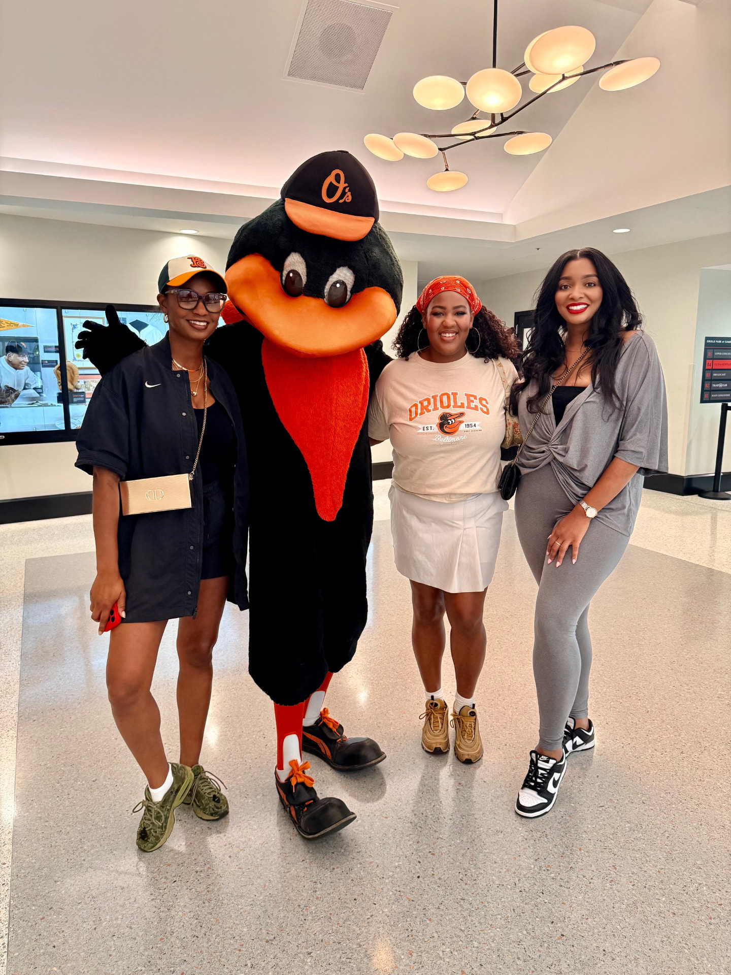 Yvonne Harper with friends and the Oriole Bird at Oriole Park at Camden Yards