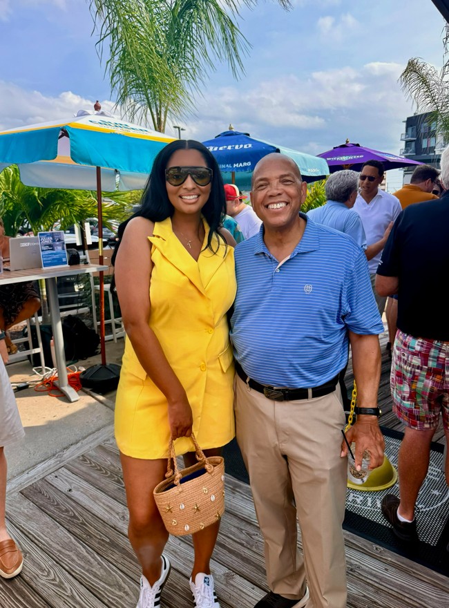 Yvonne Harper with a community leader at an outdoor Maryland event