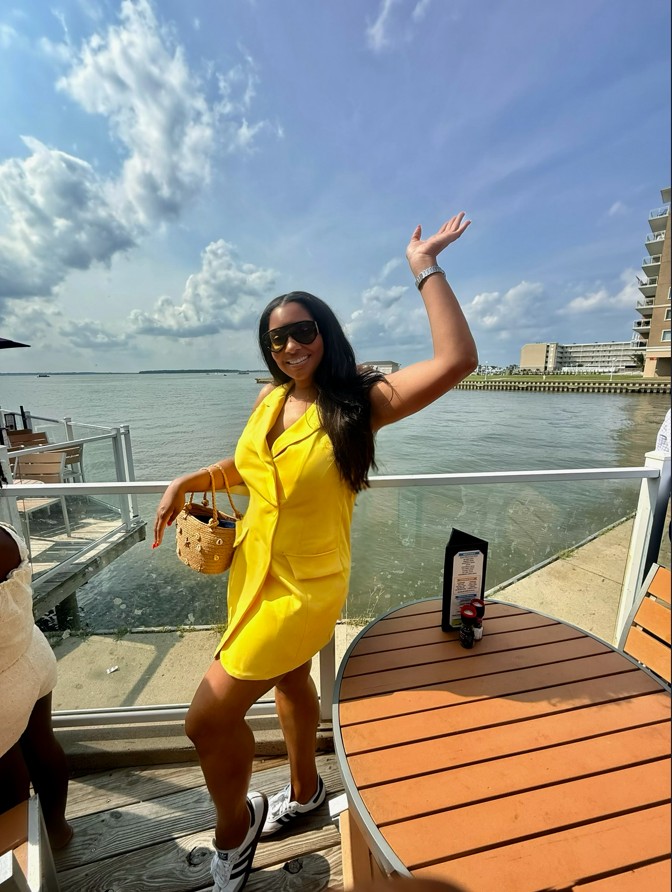Yvonne Harper waving at a waterfront event in Maryland